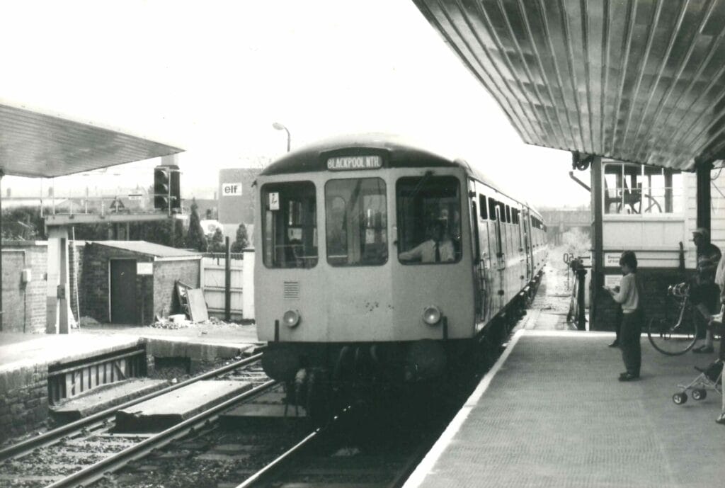 Green SIgnals and a Class 104 'White Liner' DMU arriving at Chorley with a Manchester Victoria to Blackpool North service. c.1982) Photo: Richard Bowker